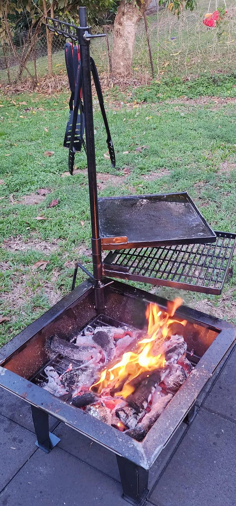 Backyard Fire Pit with Square Grill and Hot Plate.