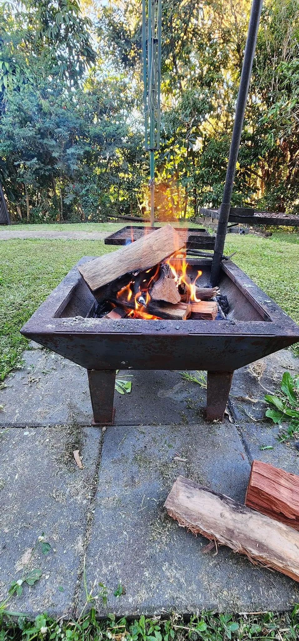 Backyard Fire Pit with Square Grill and Hot Plate.