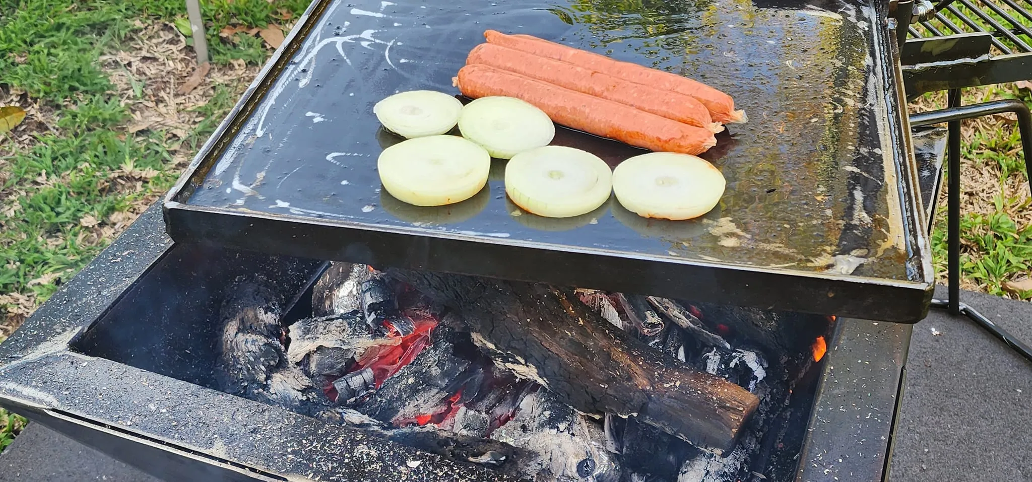 Backyard Fire Pit with Square Grill and Hot Plate.