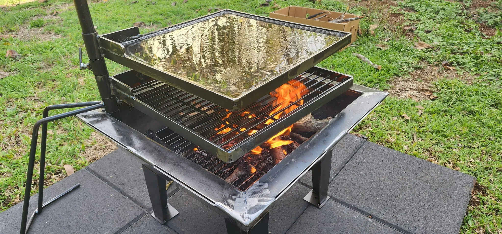 Backyard Fire Pit with Square Grill and Hot Plate.