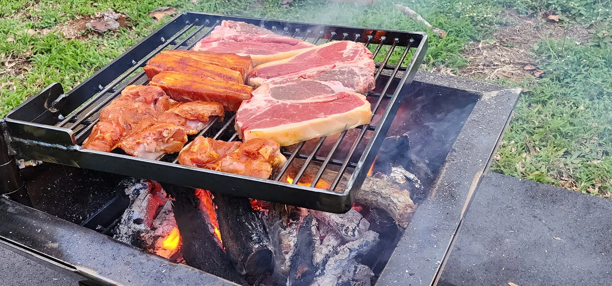 Backyard Fire Pit with Square Grill and Hot Plate.